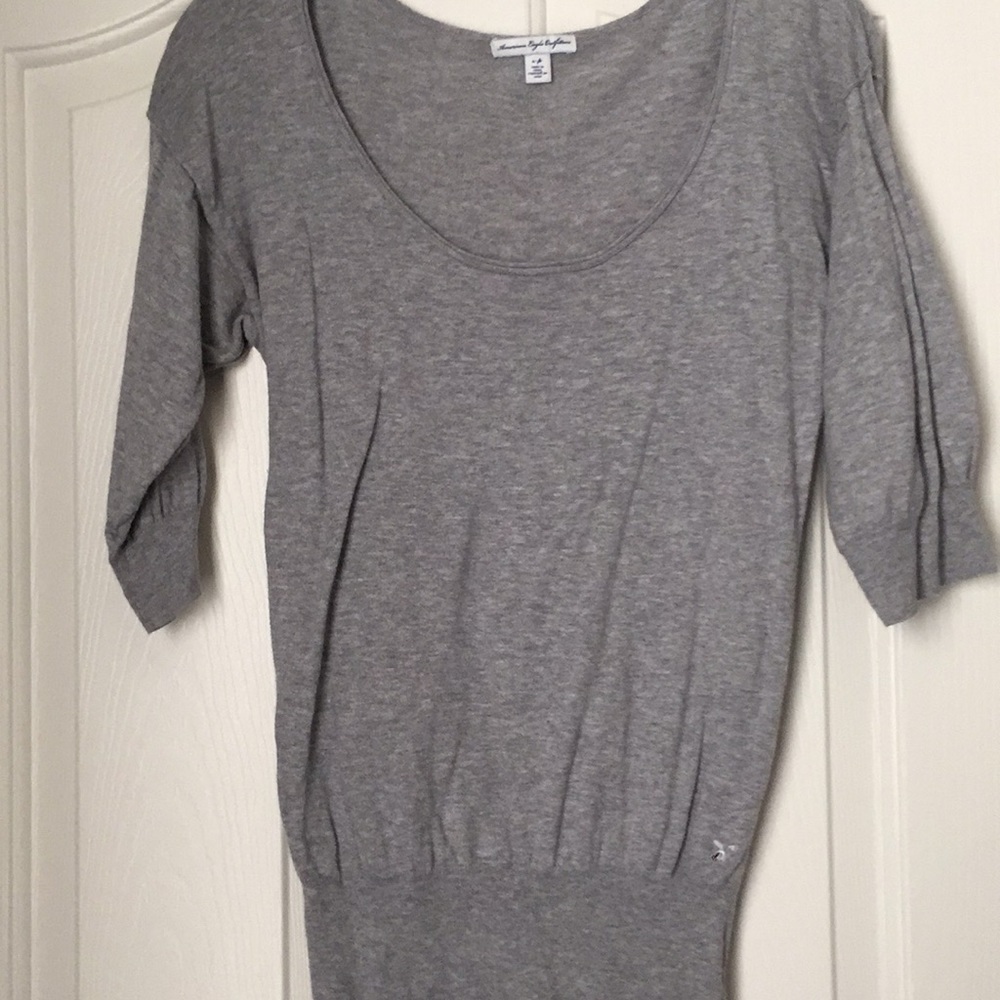 Gray blouse.